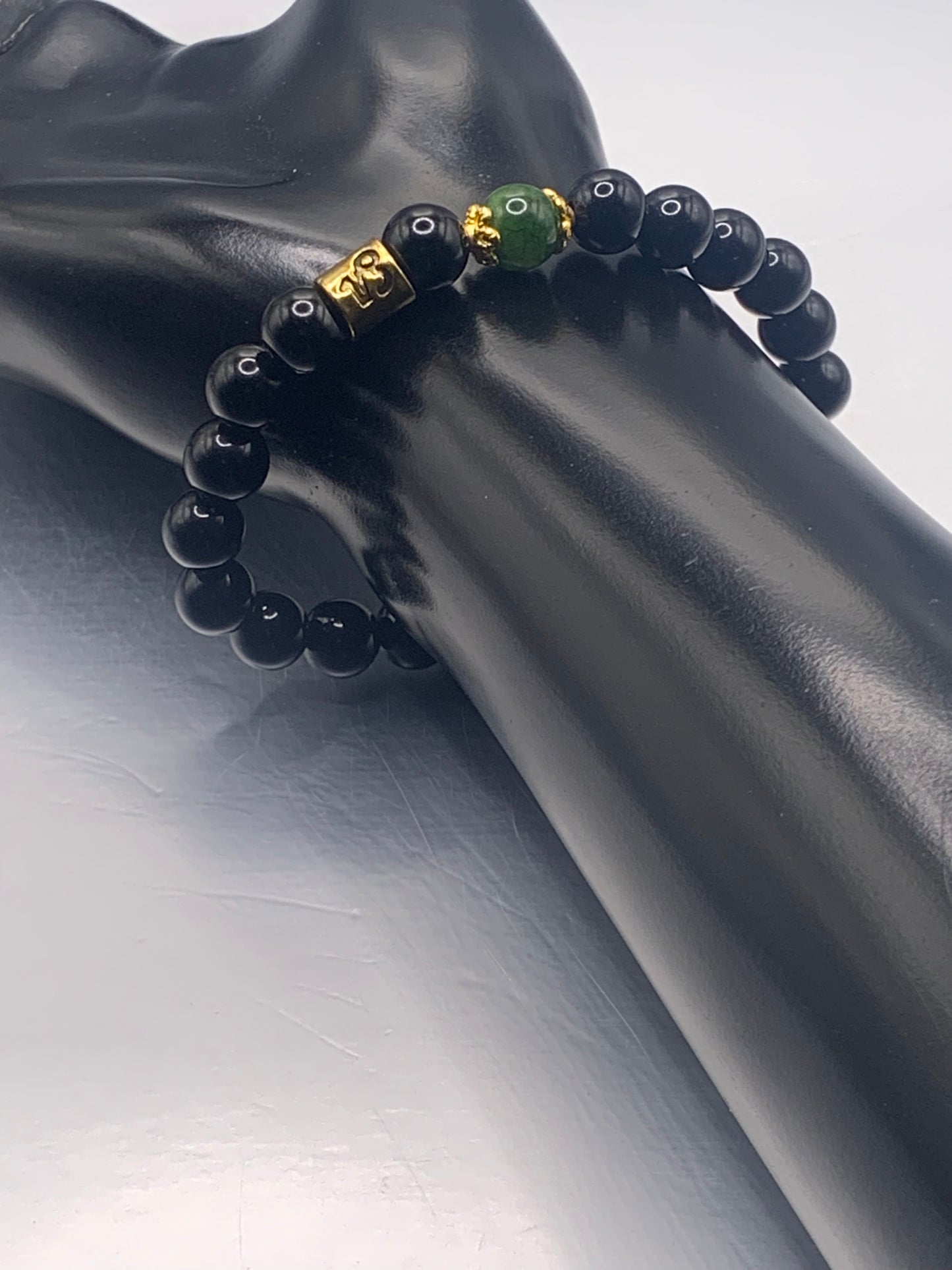 Capricorn Zodiac black obsidian with green tourmaline elastic beaded bracelet with gold accents