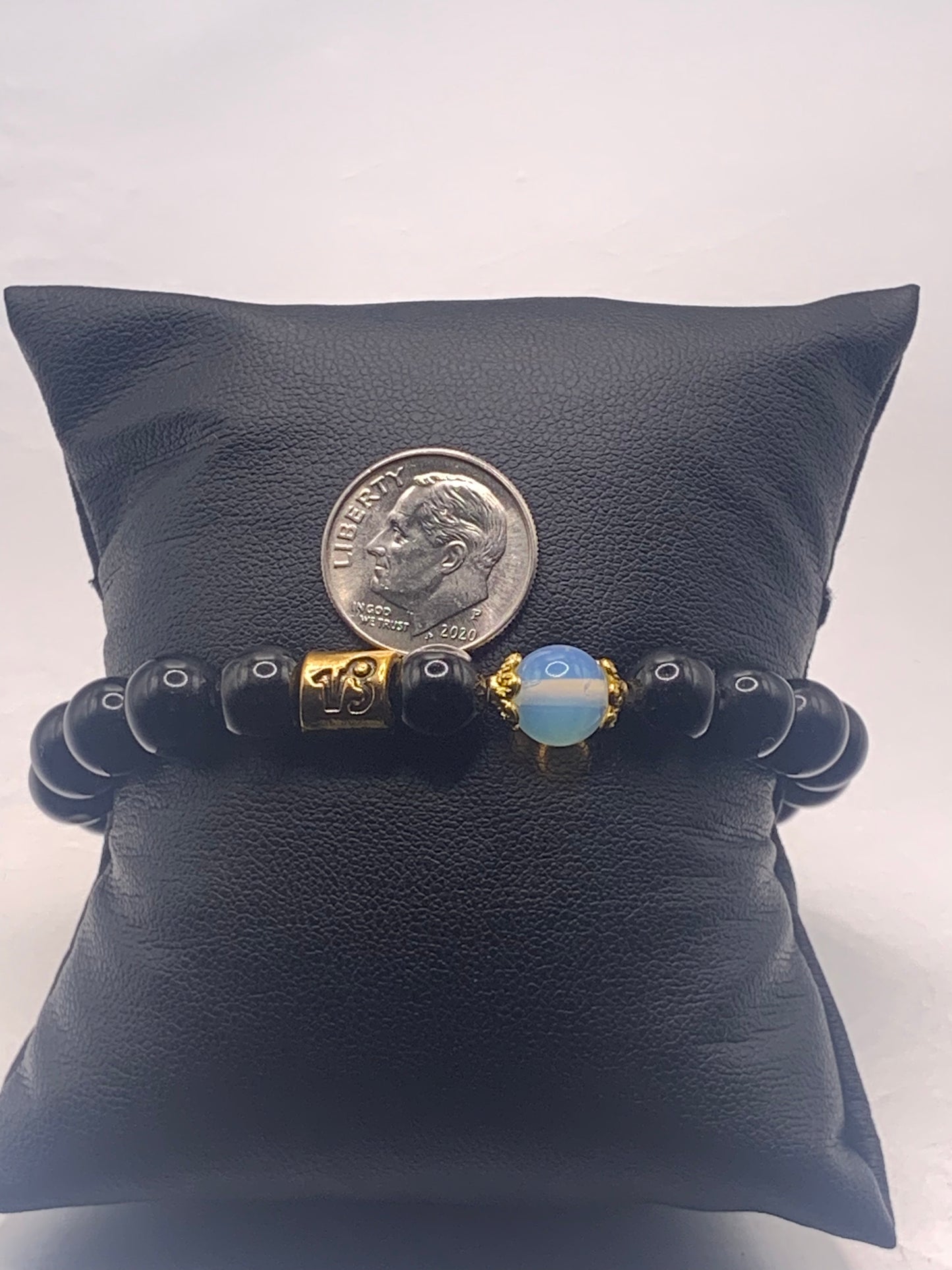 Capricorn Zodiac black obsidian with opalite elastic beaded bracelet with gold accents