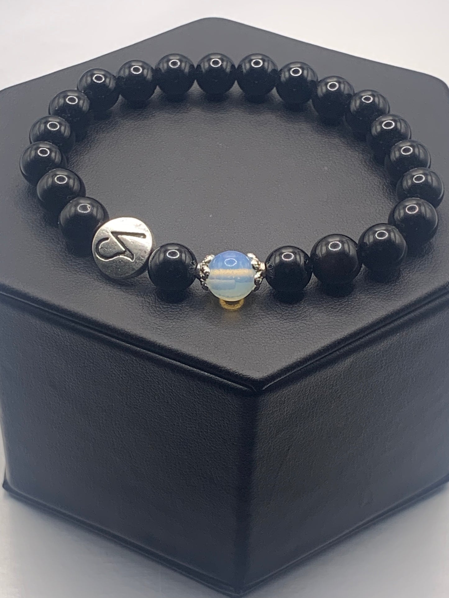 Capricorn Zodiac black obsidian with opalite elastic beaded bracelet with silver accents