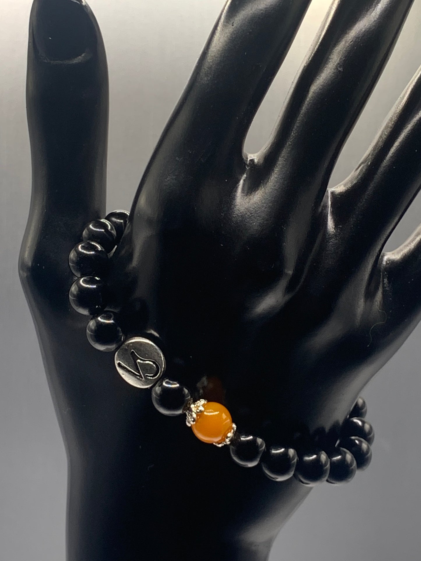 Capricorn Zodiac black obsidian with orange agate elastic beaded bracelet with silver accents