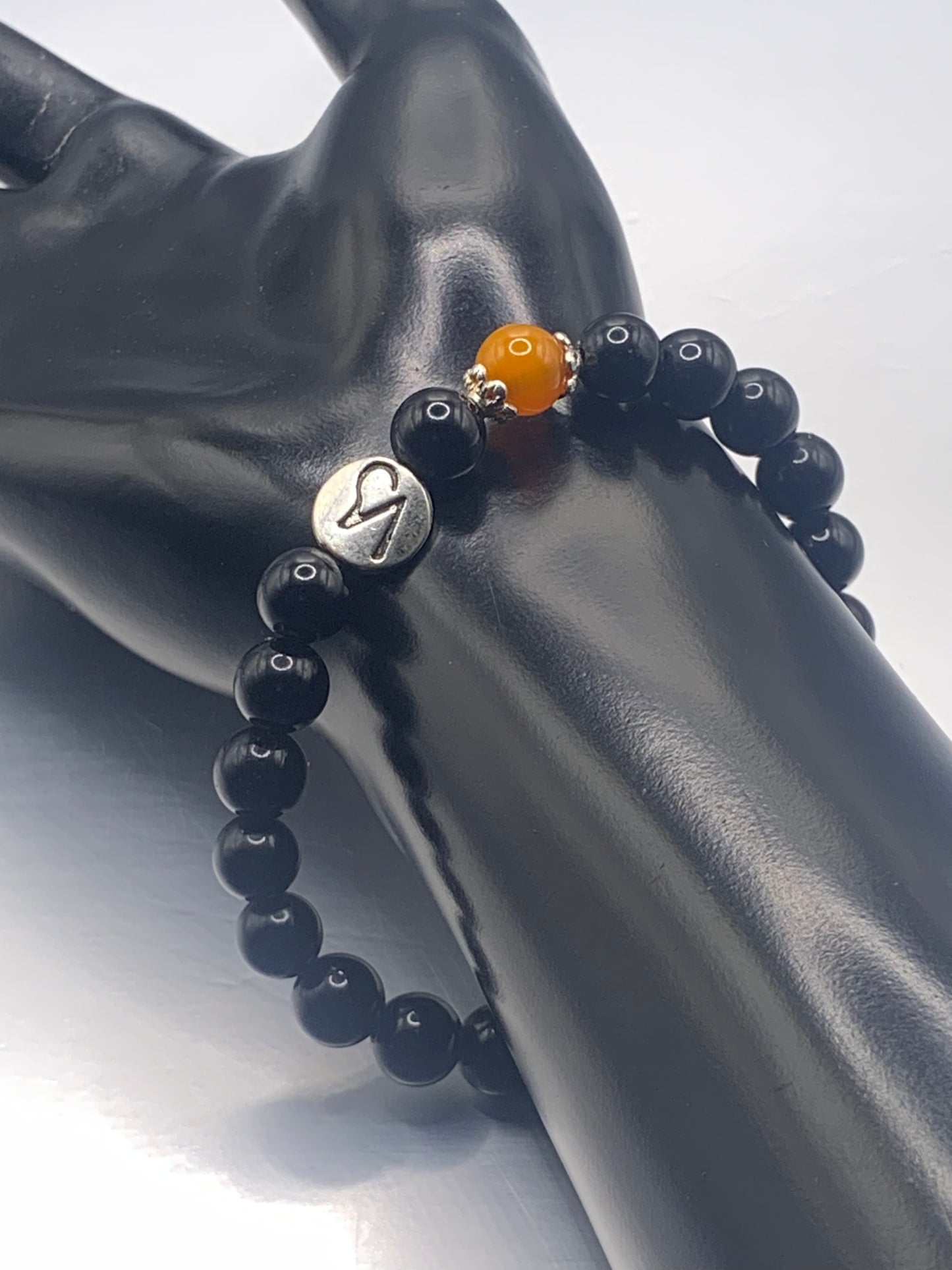 Capricorn Zodiac black obsidian with orange agate elastic beaded bracelet with silver accents