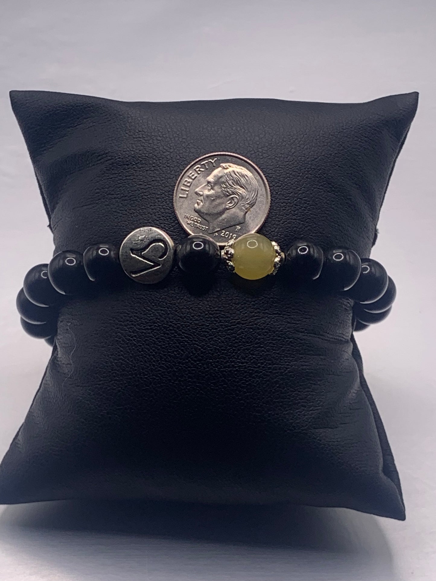 Capricorn Zodiac black obsidian with yellow agate elastic beaded bracelet with silver accents
