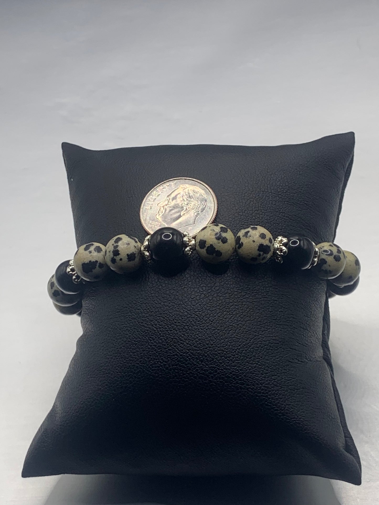 Black obsidian with dalmatian jasper semi precious stone/crystal beaded elastic bracelet with silver plated flower bead caps