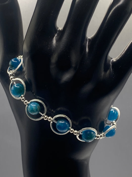 Blue apatite chalcedony semi precious stone/crystal elastic beaded bracelet with silver colored rings