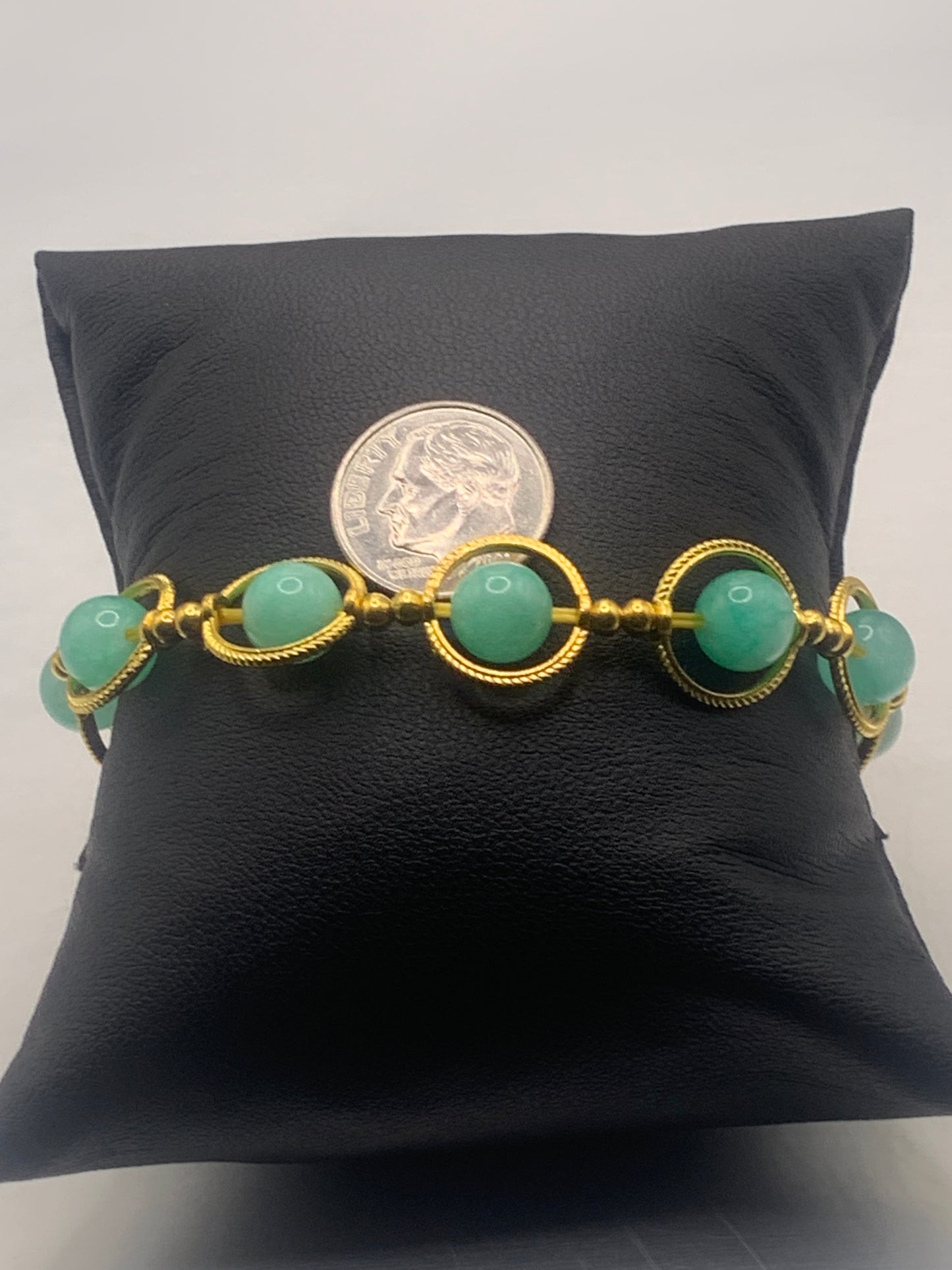 Teal chalcedony semi precious stone/crystal elastic beaded bracelet with gold colored rings