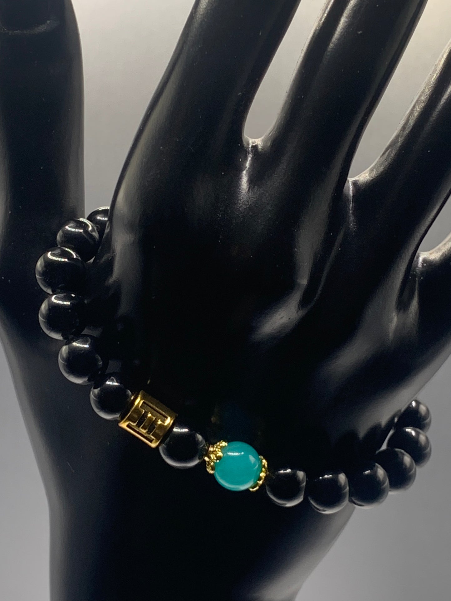 Gemini Zodiac black obsidian with aquamarine chalcedony elastic beaded bracelet with gold accents