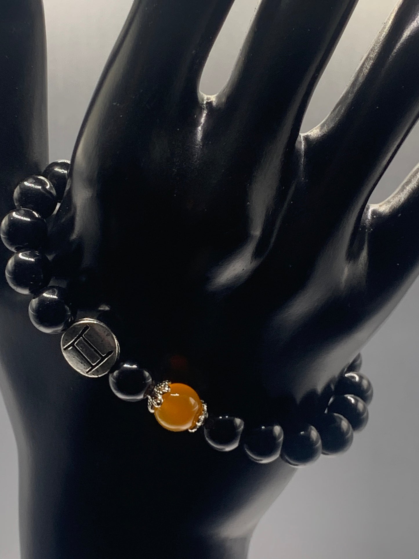 Gemini Zodiac black obsidian with orange agate elastic beaded bracelet with silver accents