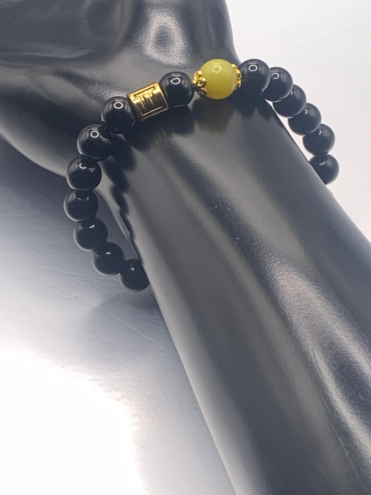 Gemini Zodiac black obsidian with yellow jade elastic beaded bracelet with gold accents