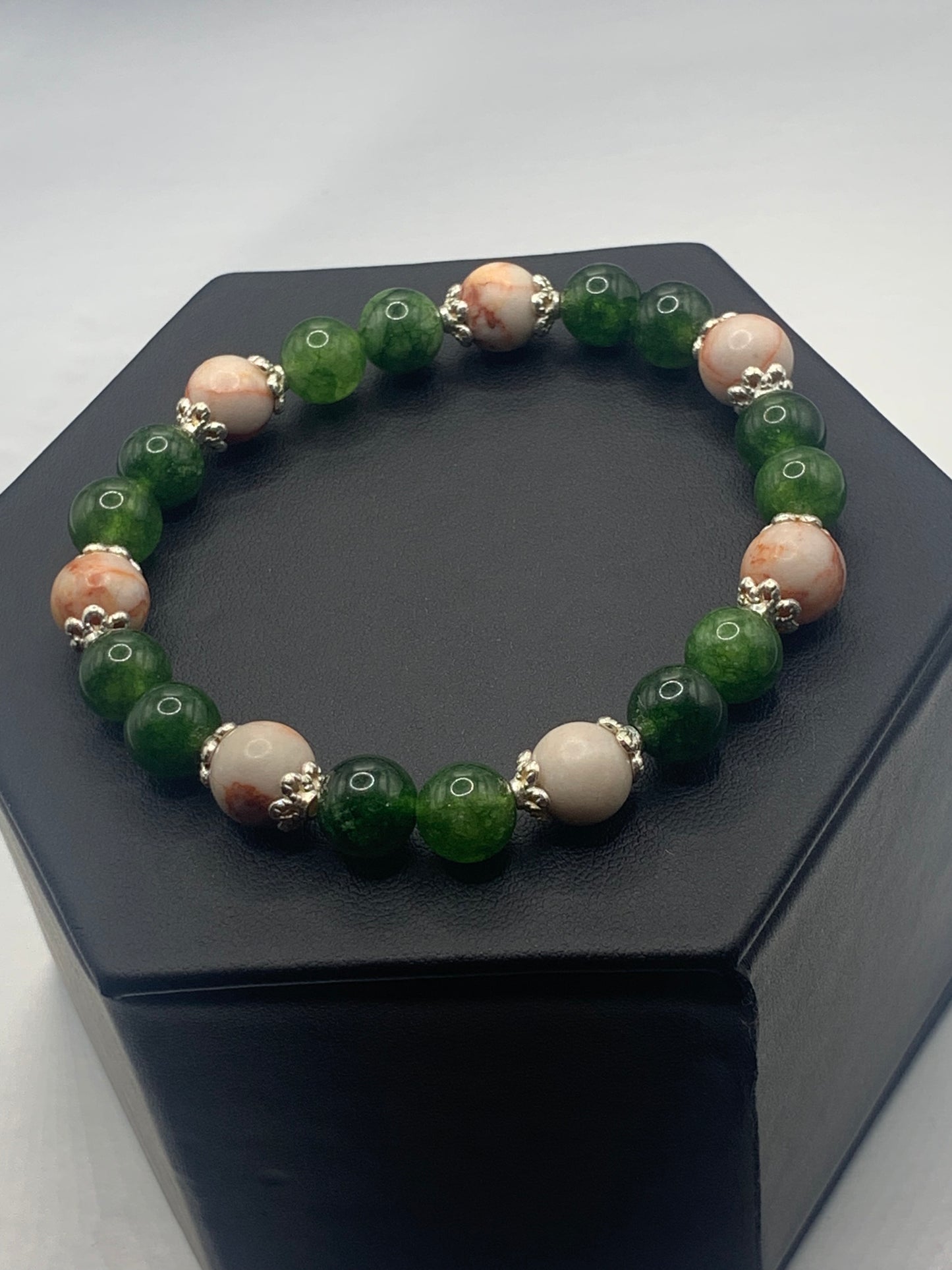 Red vein jasper and green tourmaline semi precious stone/crystal elastic beaded bracelet with silver plated flower bead caps