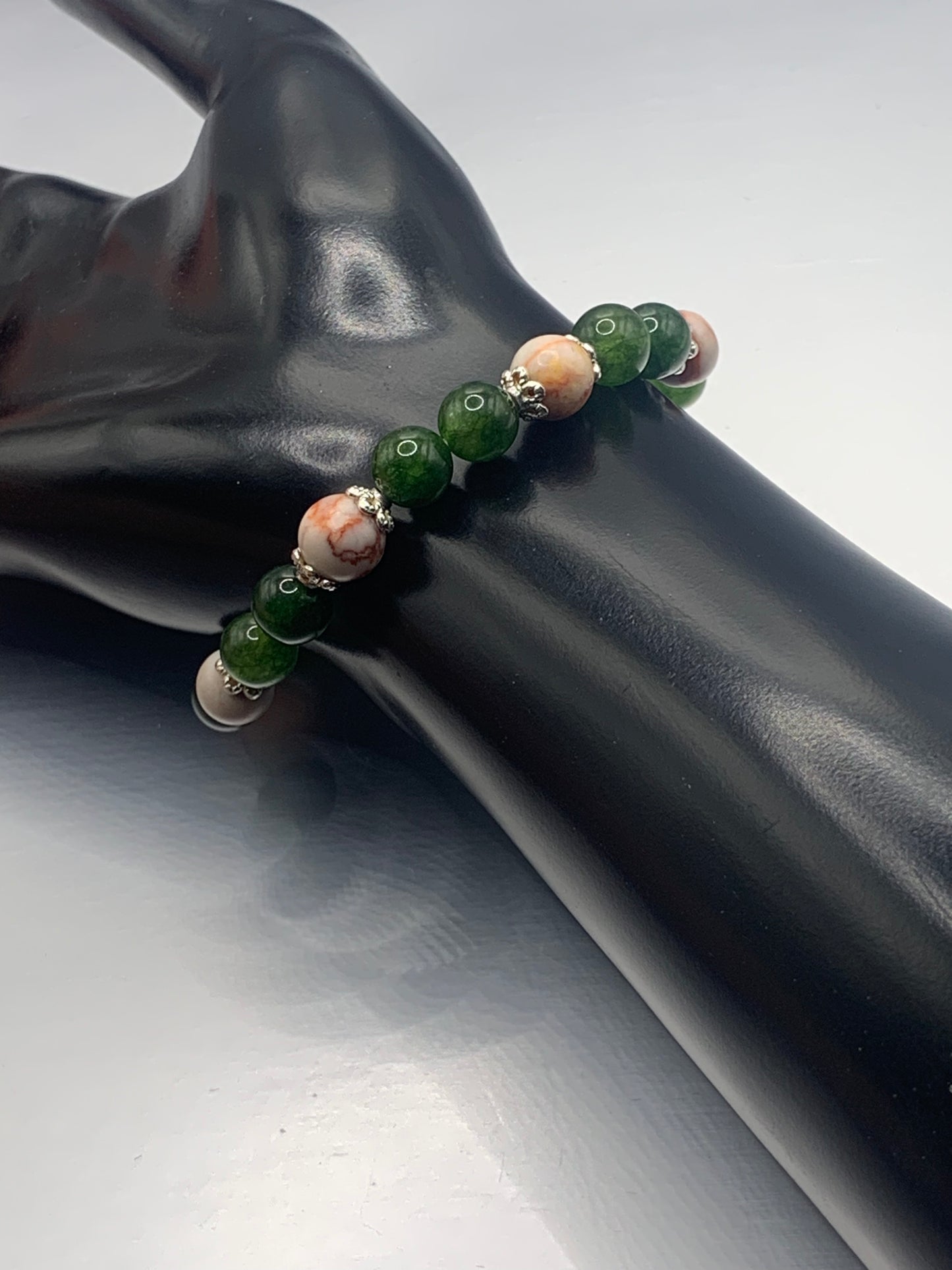 Red vein jasper and green tourmaline semi precious stone/crystal elastic beaded bracelet with silver plated flower bead caps