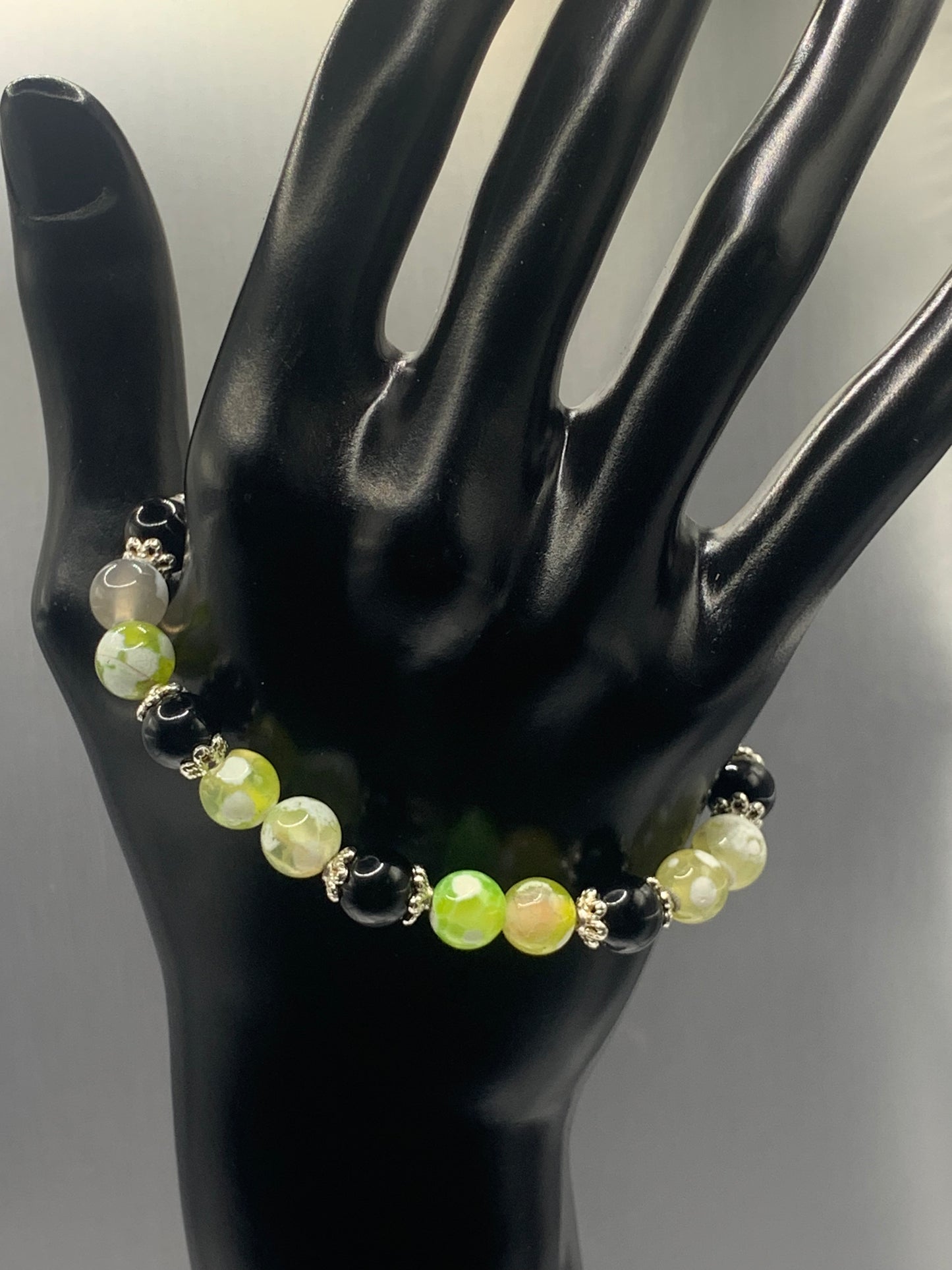 Black obsidian with yellow green white orca agate semi precious stone/crystal beaded elastic bracelet with silver plated flower bead caps