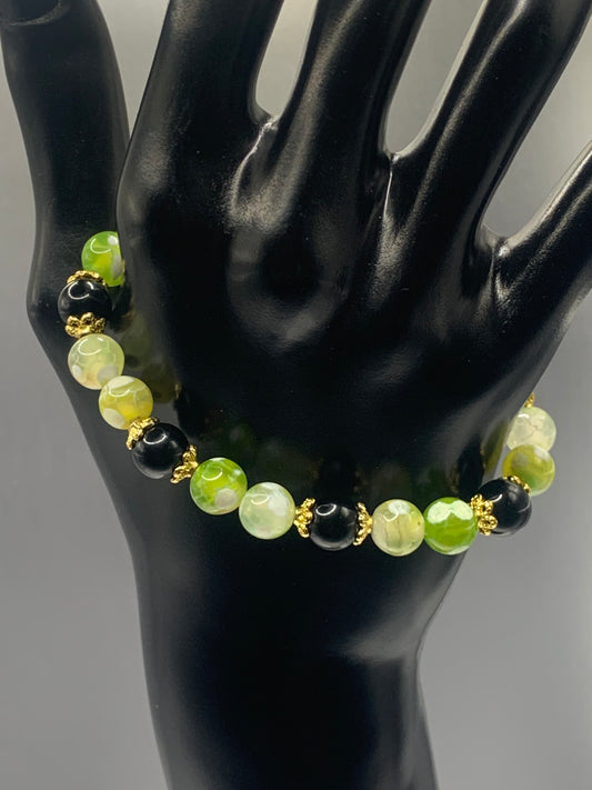 Black obsidian with yellow green white orca agate semi precious stone/crystal beaded elastic bracelet with gold plated flower bead caps