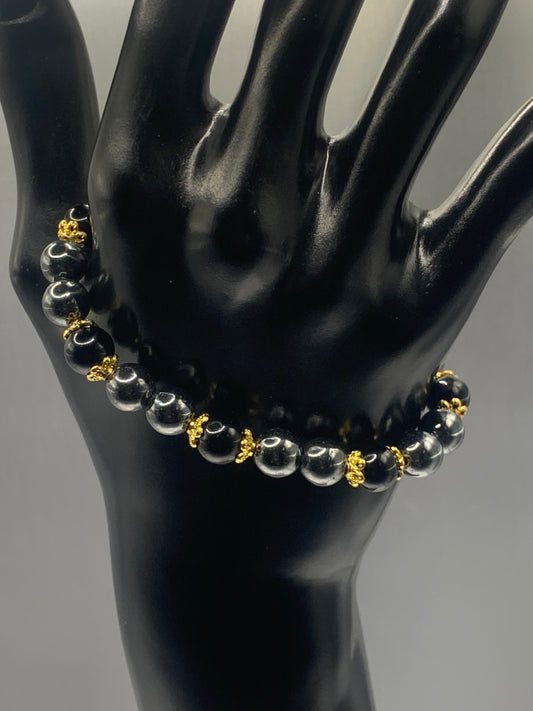 Black obsidian with hematite semi precious stone/crystal beaded elastic bracelet with gold plated flower bead caps