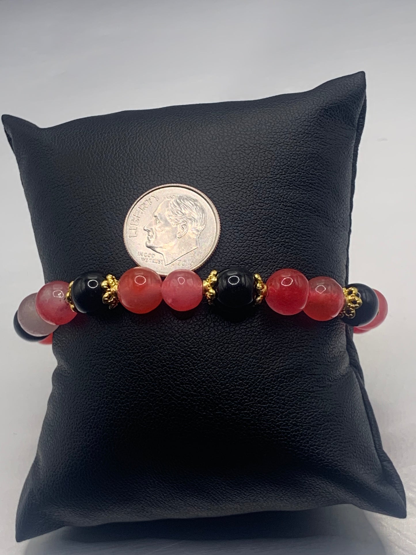Black obsidian with hot pink agate semi precious stone/crystal beaded elastic bracelet with gold plated flower bead caps