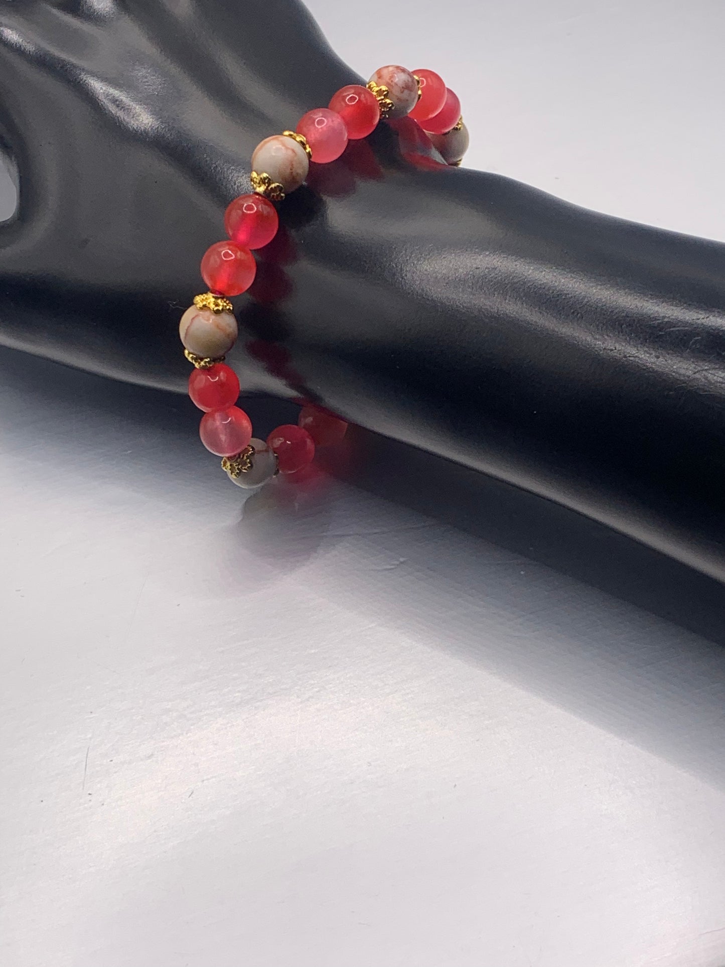 Red vein jasper and hot pink agate semi precious stone/crystal elastic beaded bracelet with gold plated flower bead caps