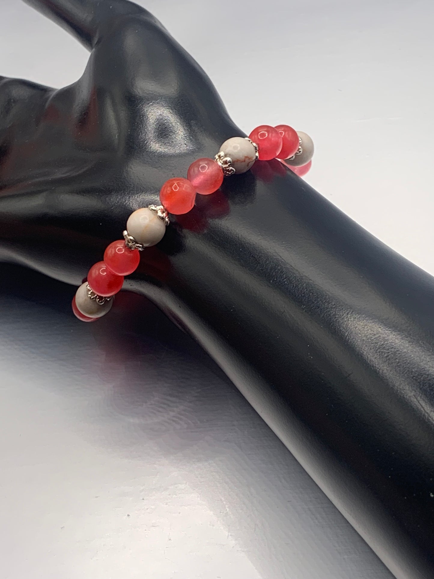 Red vein jasper and hot pink agate semi precious stone/crystal elastic beaded bracelet with silver plated flower bead caps