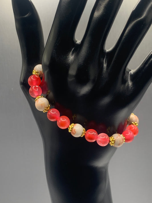 Red vein jasper and hot pink agate semi precious stone/crystal elastic beaded bracelet with gold plated flower bead caps