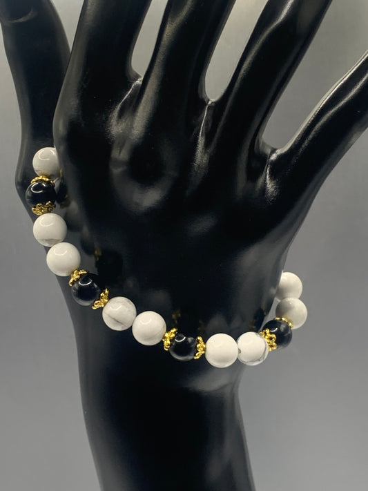 Black obsidian with howlite semi precious stone/crystal beaded elastic bracelet with gold plated flower bead caps