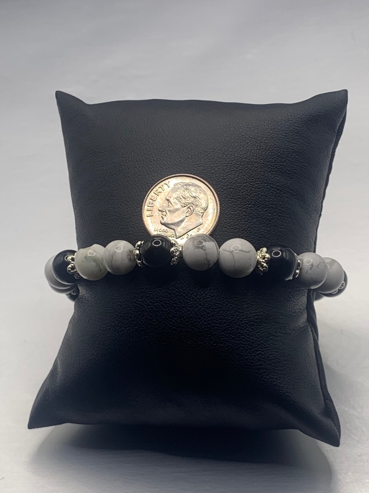 Black obsidian with howlite semi precious stone/crystal beaded elastic bracelet with silver plated flower bead caps