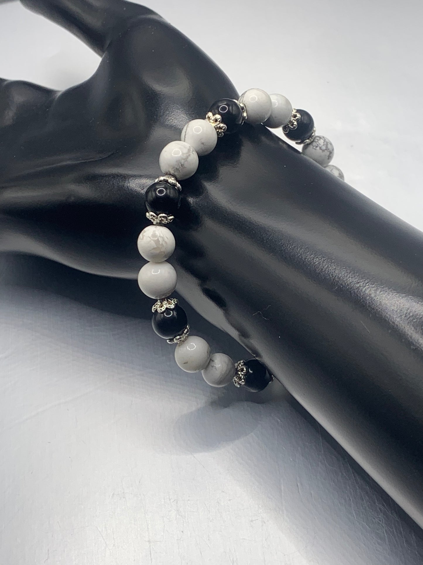 Black obsidian with howlite semi precious stone/crystal beaded elastic bracelet with silver plated flower bead caps