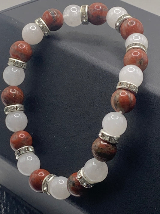 Red sesame jasper and white chalcedony semi precious stone/crystal elastic beaded bracelet with clear rondelle's