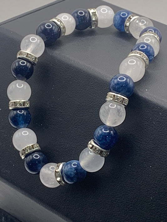 Dark blue tourmaline and white chalcedony semi precious stone/crystal elastic beaded bracelet with clear rondelle's
