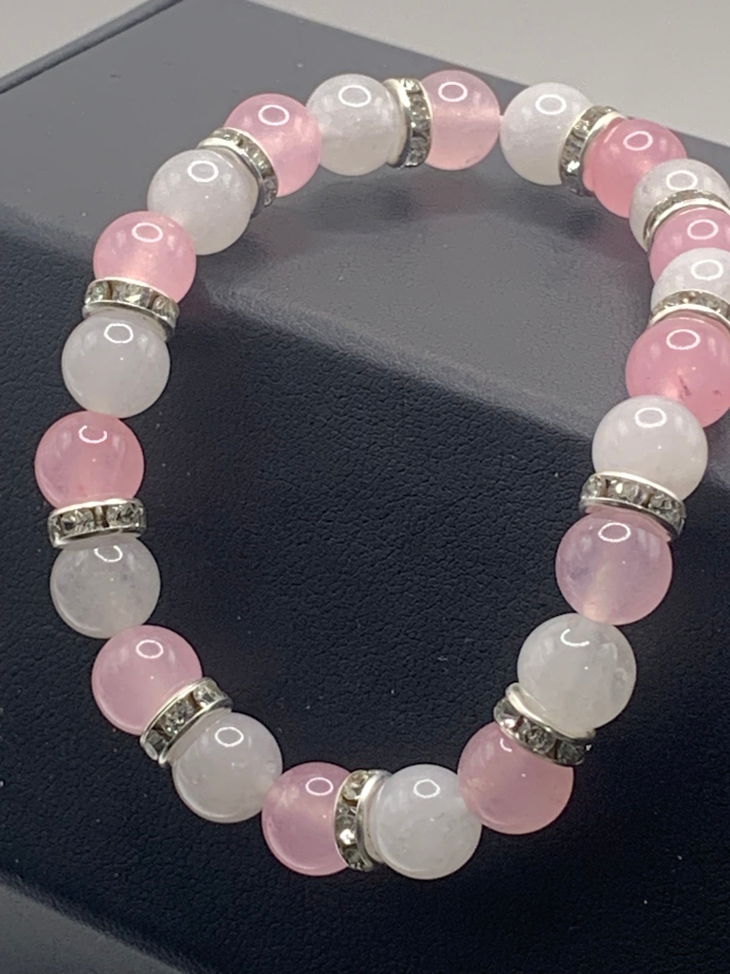 Rose quartz and white chalcedony semi precious stone/crystal elastic beaded bracelet with clear rondelle's