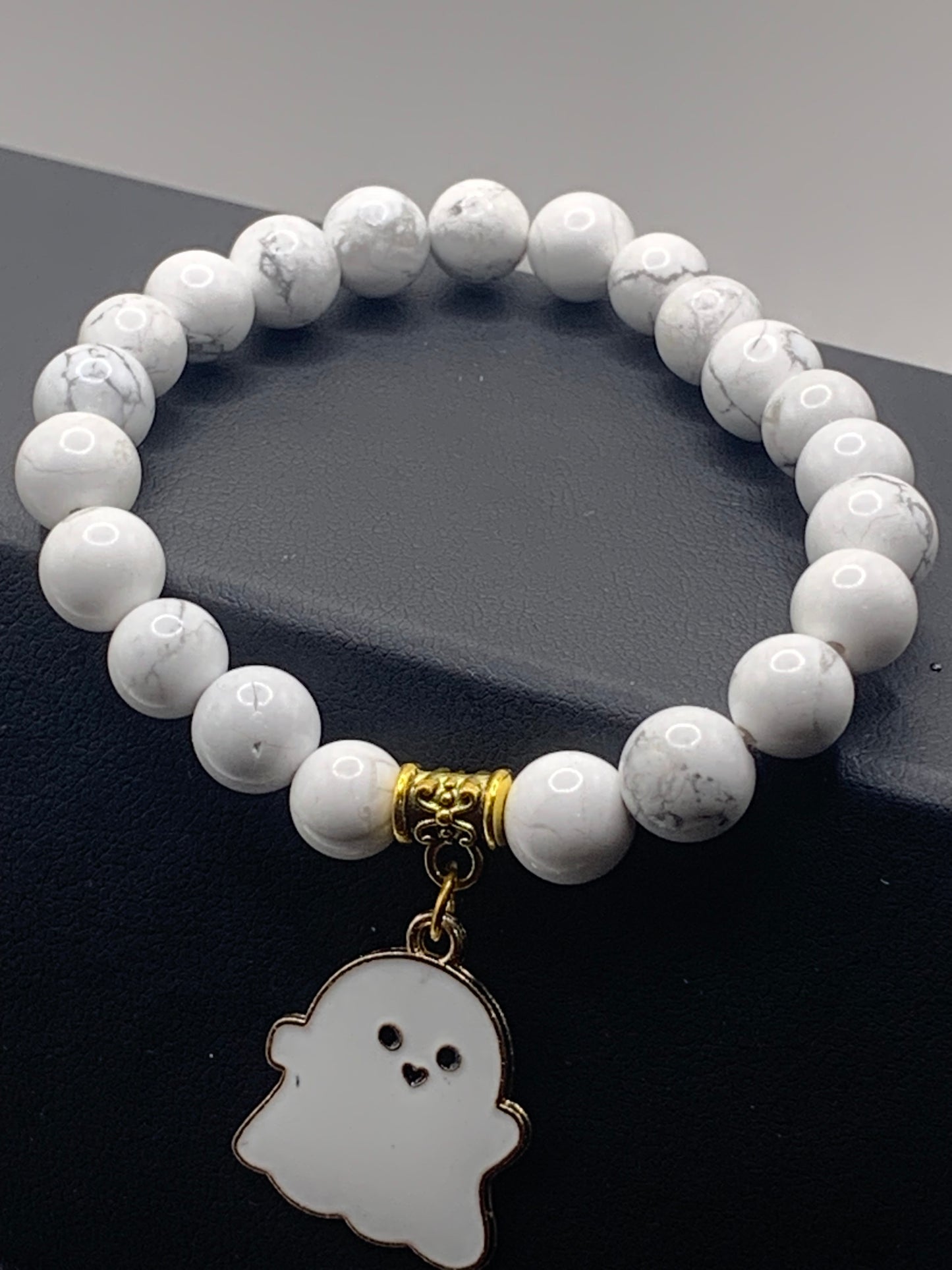 Howlite semi precious stone/crystal elastic beaded bracelet with Halloween charm
