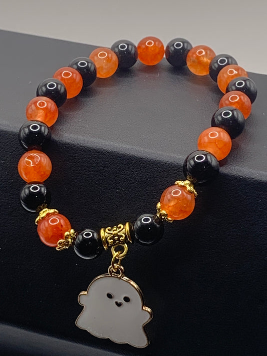 Black obsidian and phoenix agate semi precious stone/crystal elastic beaded bracelet with Halloween charm