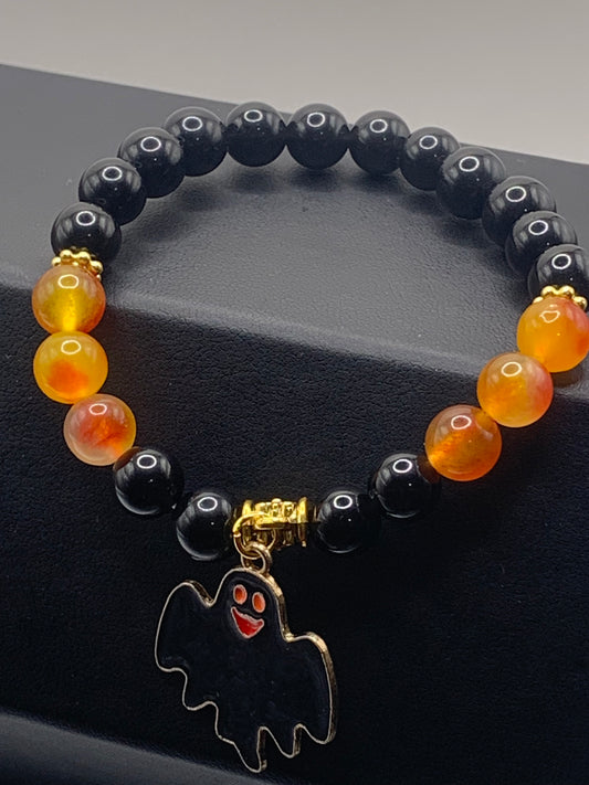 Black obsidian and orange blossom chalcedony semi precious stone/crystal elastic beaded bracelet with Halloween charm