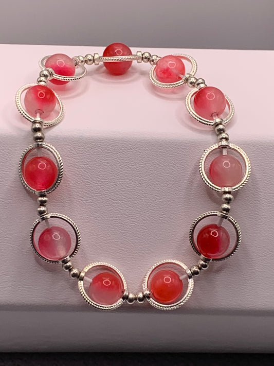 Hot pink agate semi precious stone/crystal elastic beaded bracelet with silver colored rings