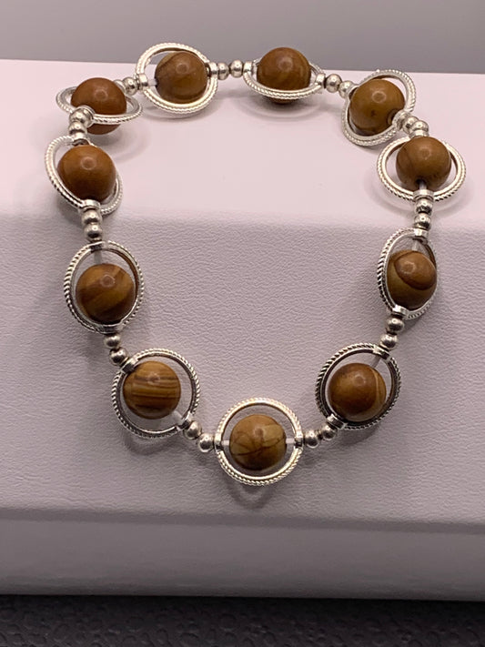 Wood jasper semi precious stone/crystal elastic beaded bracelet with silver colored rings