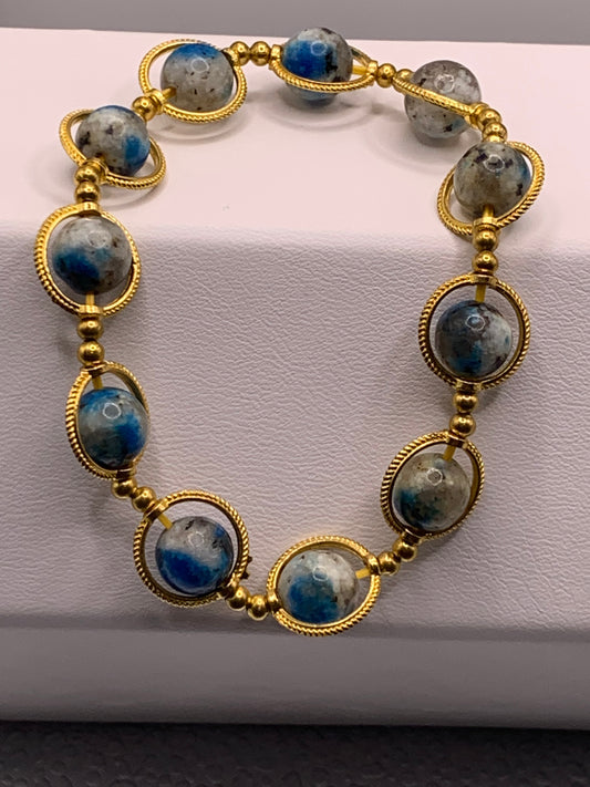 K2 jasper semi precious stone/crystal elastic beaded bracelet with gold colored rings