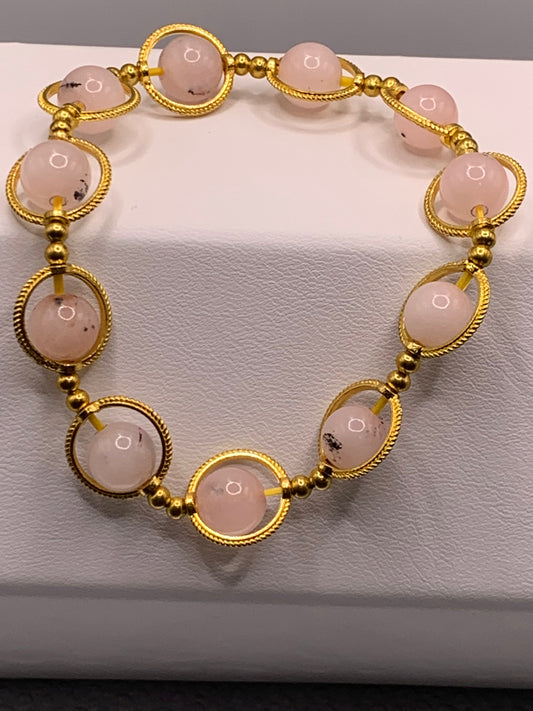 Pink opal chalcedony semi precious stone/crystal elastic beaded bracelet with gold colored rings