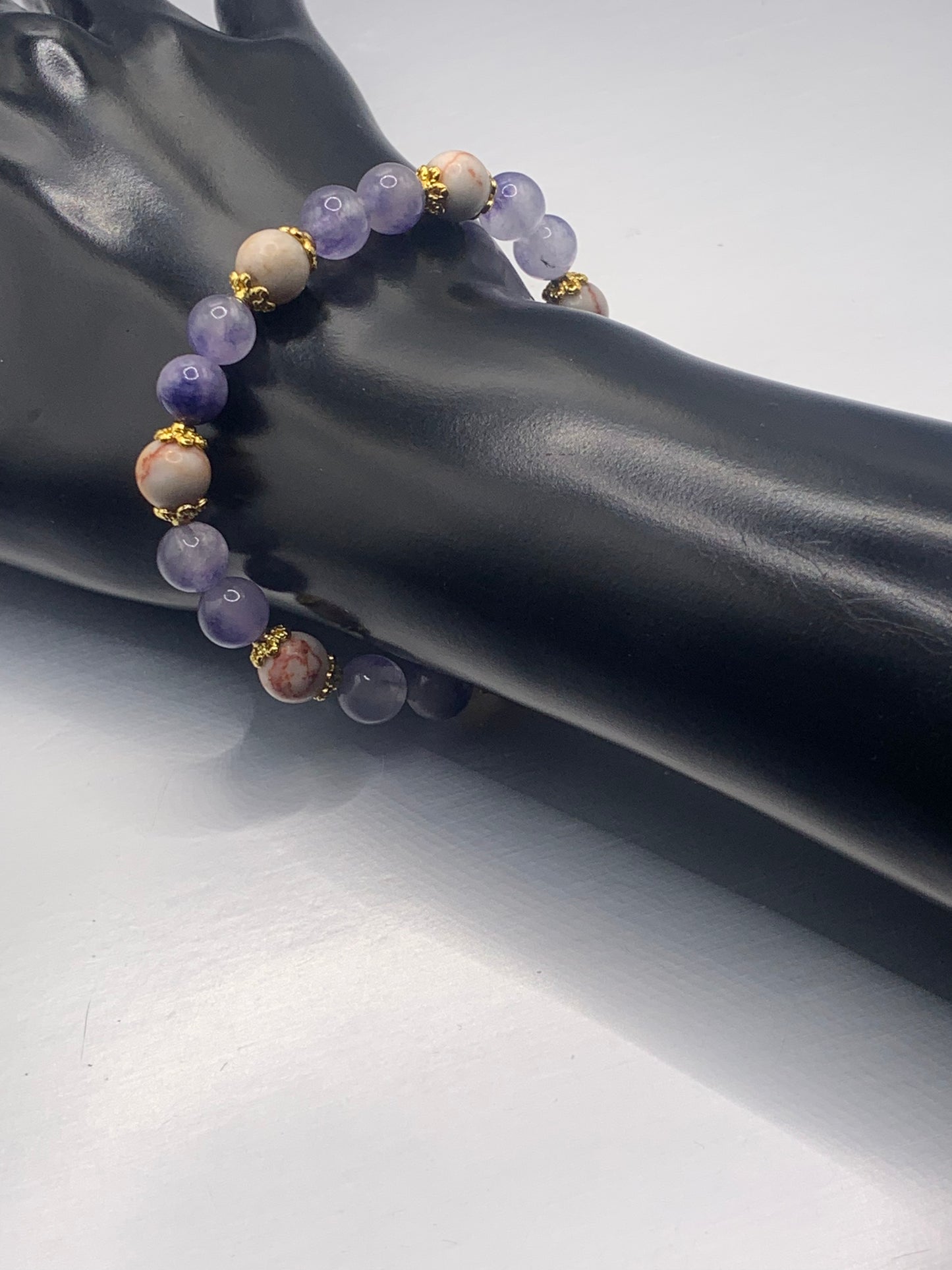 Red vein jasper and ice blue agate semi precious stone/crystal elastic beaded bracelet with gold plated flower bead caps