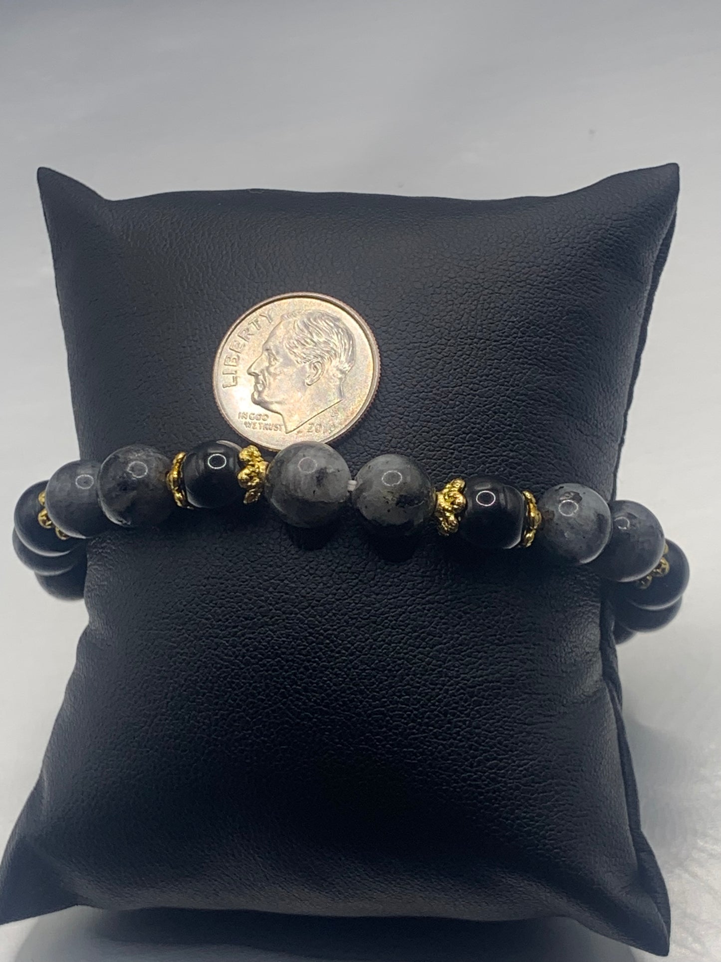 Black obsidian with larvikite semi precious stone/crystal beaded elastic bracelet with gold plated flower bead caps