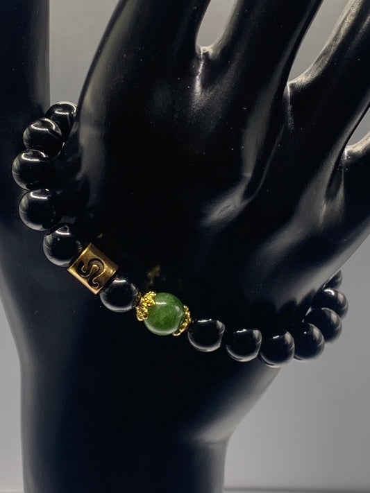 Leo Zodiac black obsidian with green tourmaline elastic beaded bracelet with gold accents