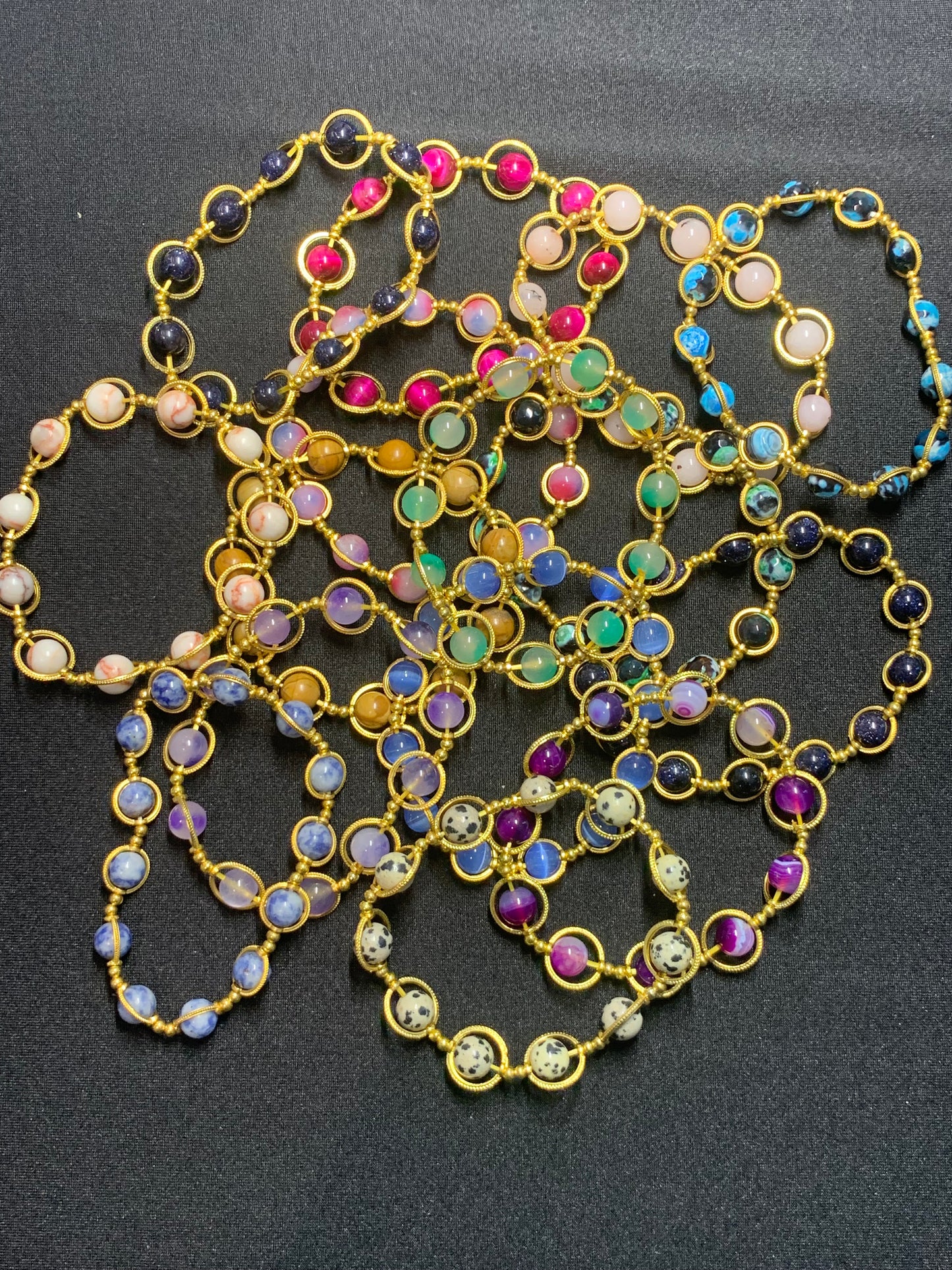 Multicolored beaded necklace on a dark background
