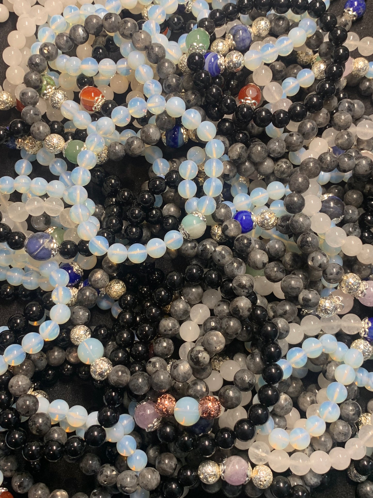 Close-up of multicolored beaded strands.