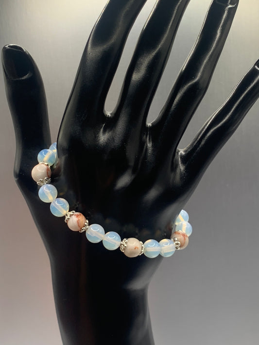 Red vein jasper and opalite semi precious stone/crystal elastic beaded bracelet with silver plated flower bead caps