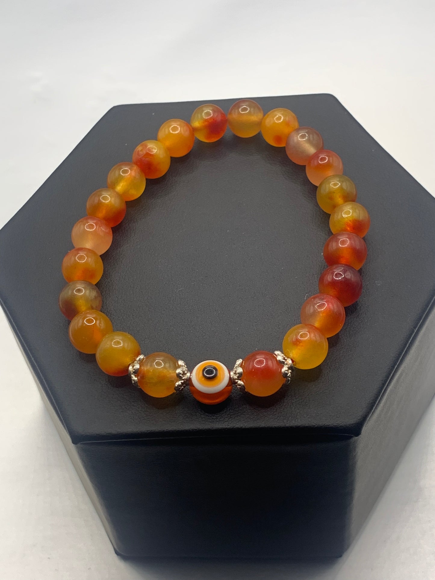 Orange blossom chalcedony semi precious stone/crystal with resin evil eye beaded elastic bracelet