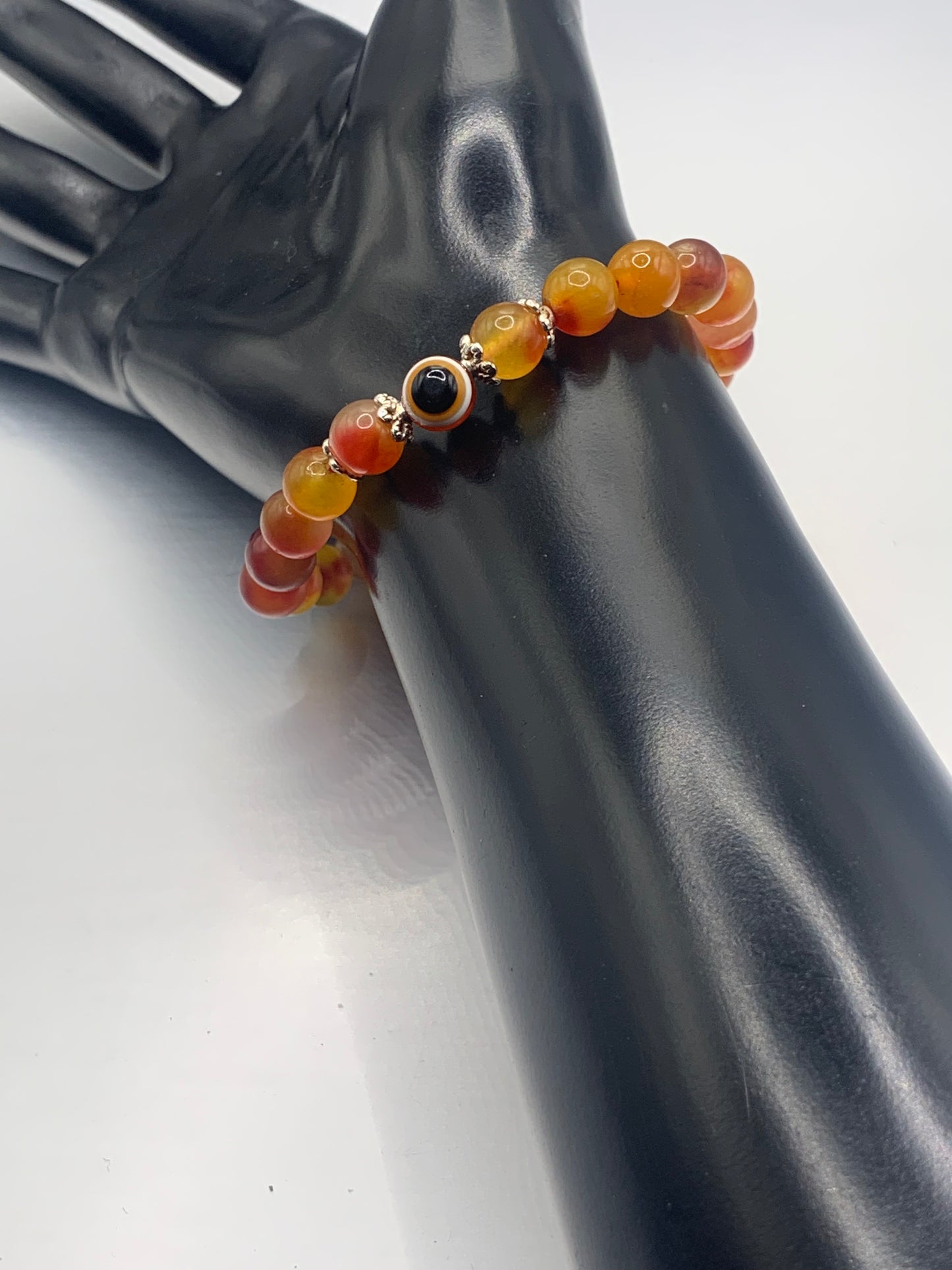 Orange blossom chalcedony semi precious stone/crystal with resin evil eye beaded elastic bracelet