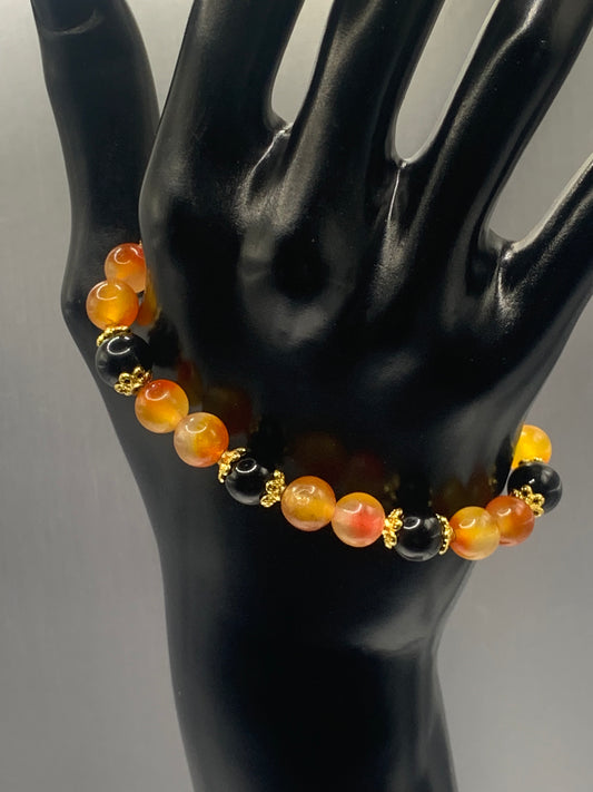 Black obsidian with orange blossom chalcedony semi precious stone/crystal beaded elastic bracelet with gold plated flower bead caps