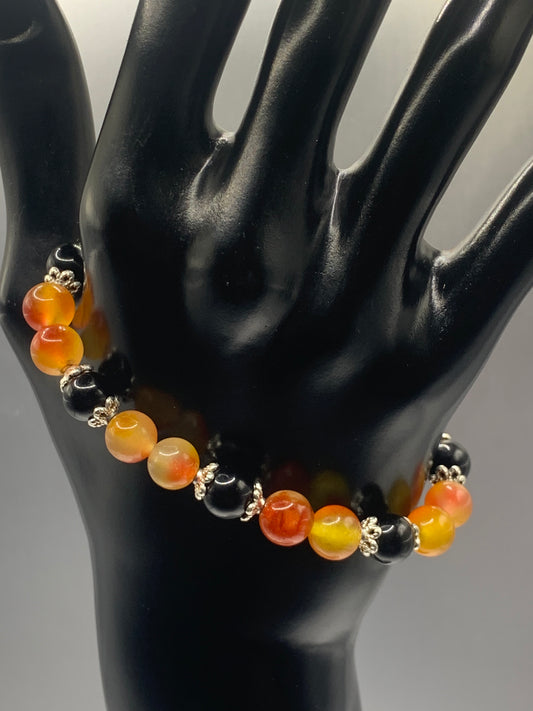 Black obsidian with orange blossom chalcedony semi precious stone/crystal beaded elastic bracelet with silver plated flower bead caps