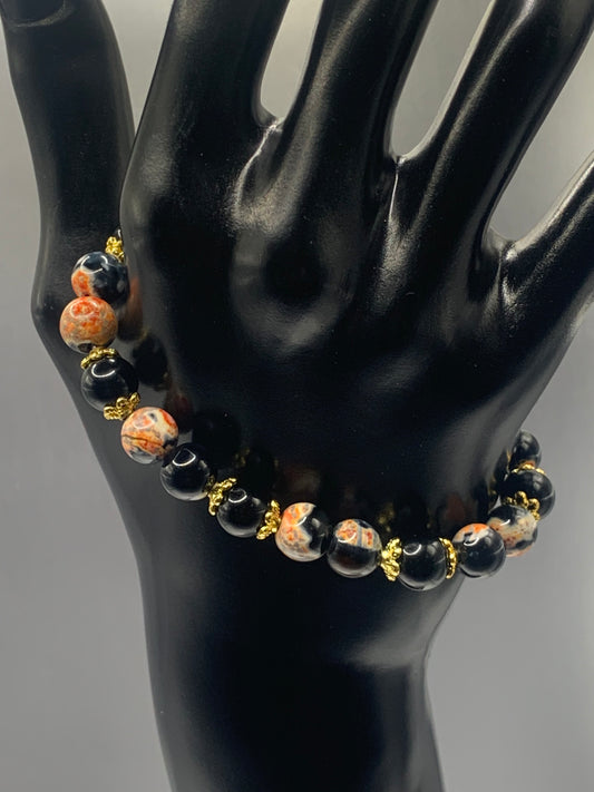 Black obsidian with orange orca agate semi precious stone/crystal beaded elastic bracelet with gold plated flower bead caps