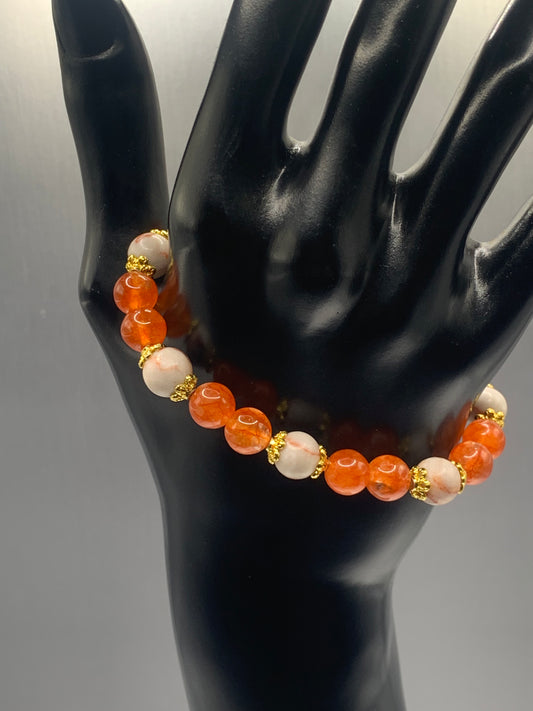 Red vein jasper and phoenix agate semi precious stone/crystal elastic beaded bracelet with gold plated flower bead caps