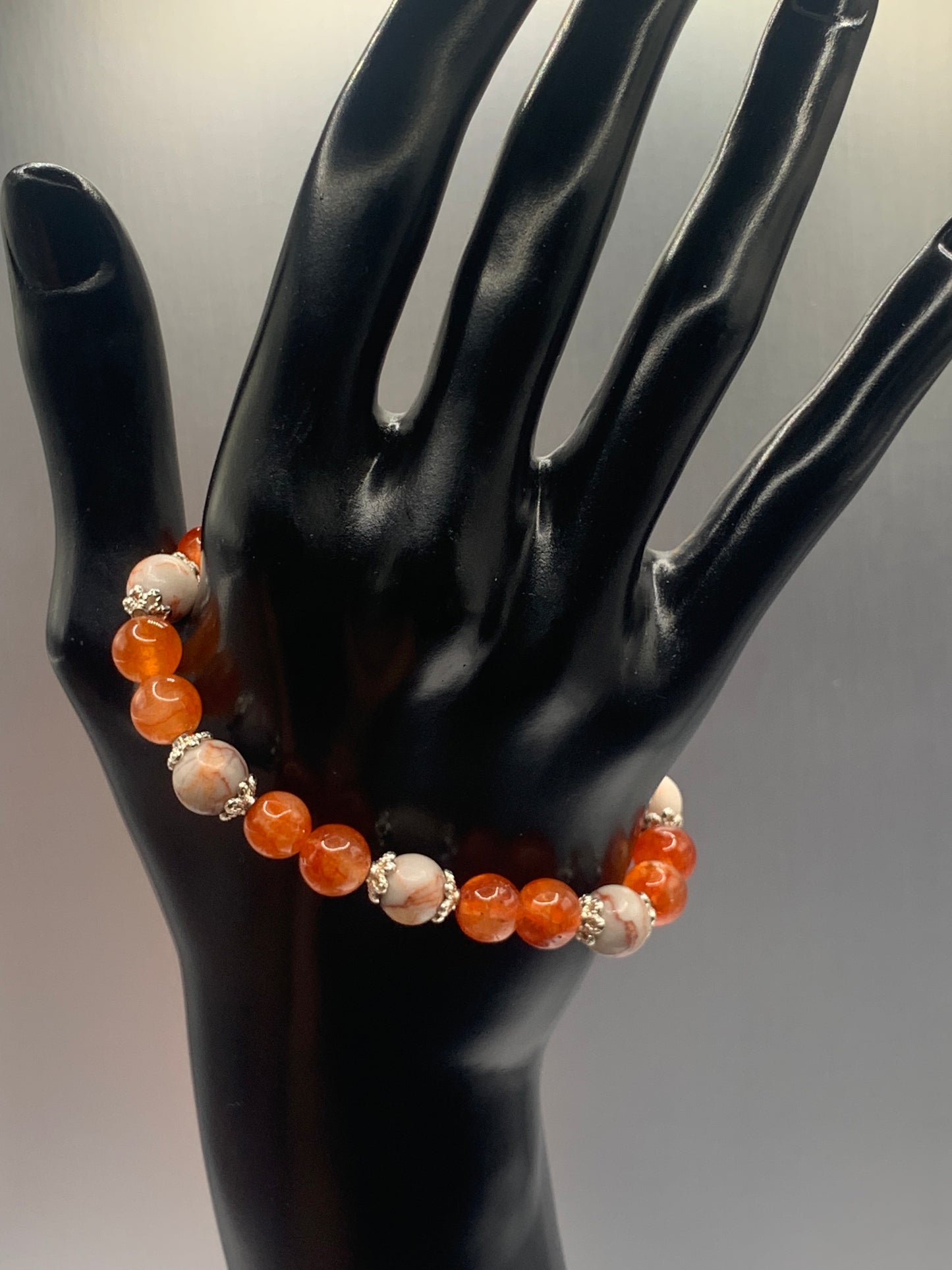 Red vein jasper and phoenix agate semi precious stone/crystal elastic beaded bracelet with silver plated flower bead caps
