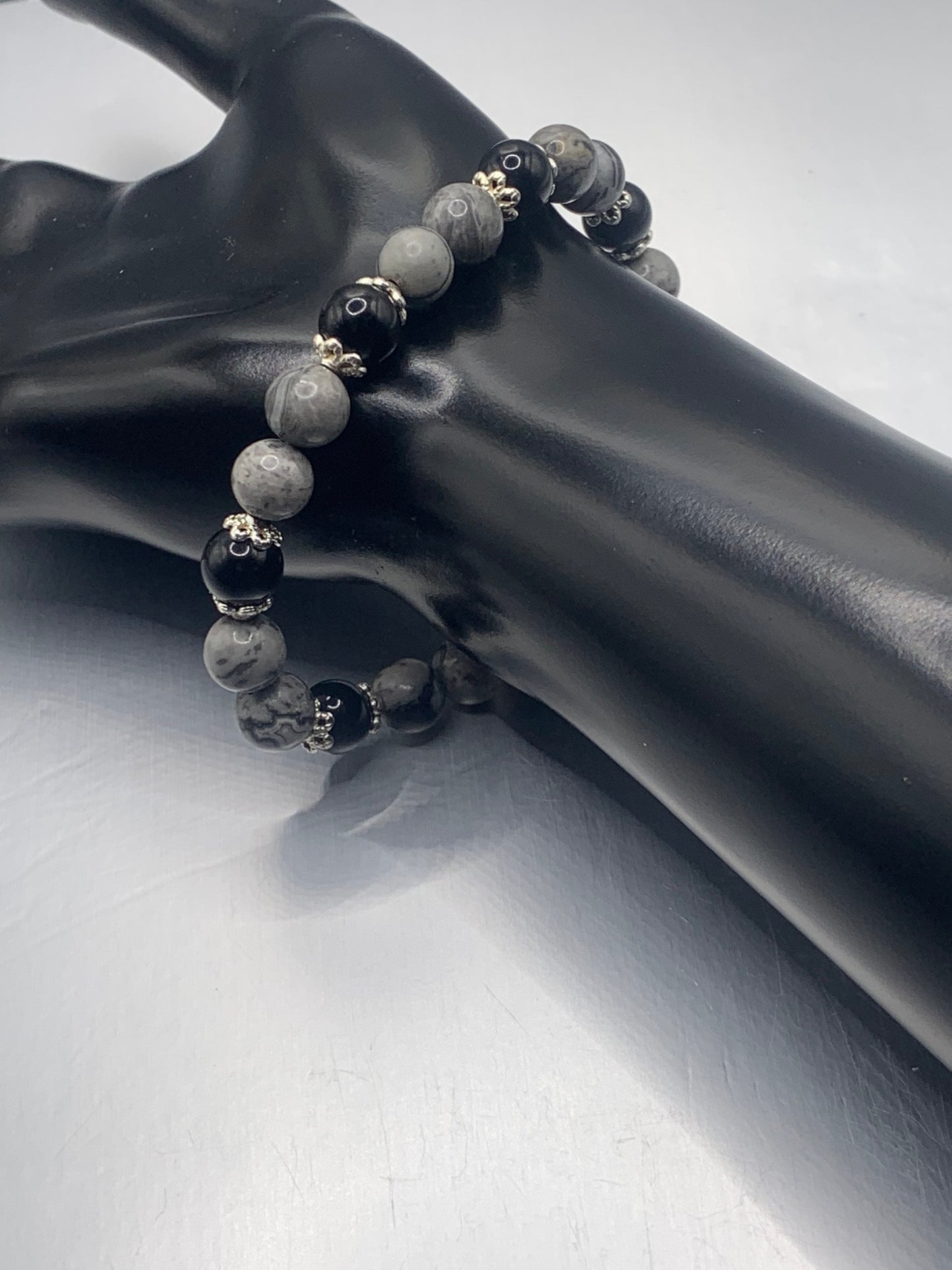 Black obsidian with picasso jasper semi precious stone/crystal beaded elastic bracelet with silver plated flower bead caps