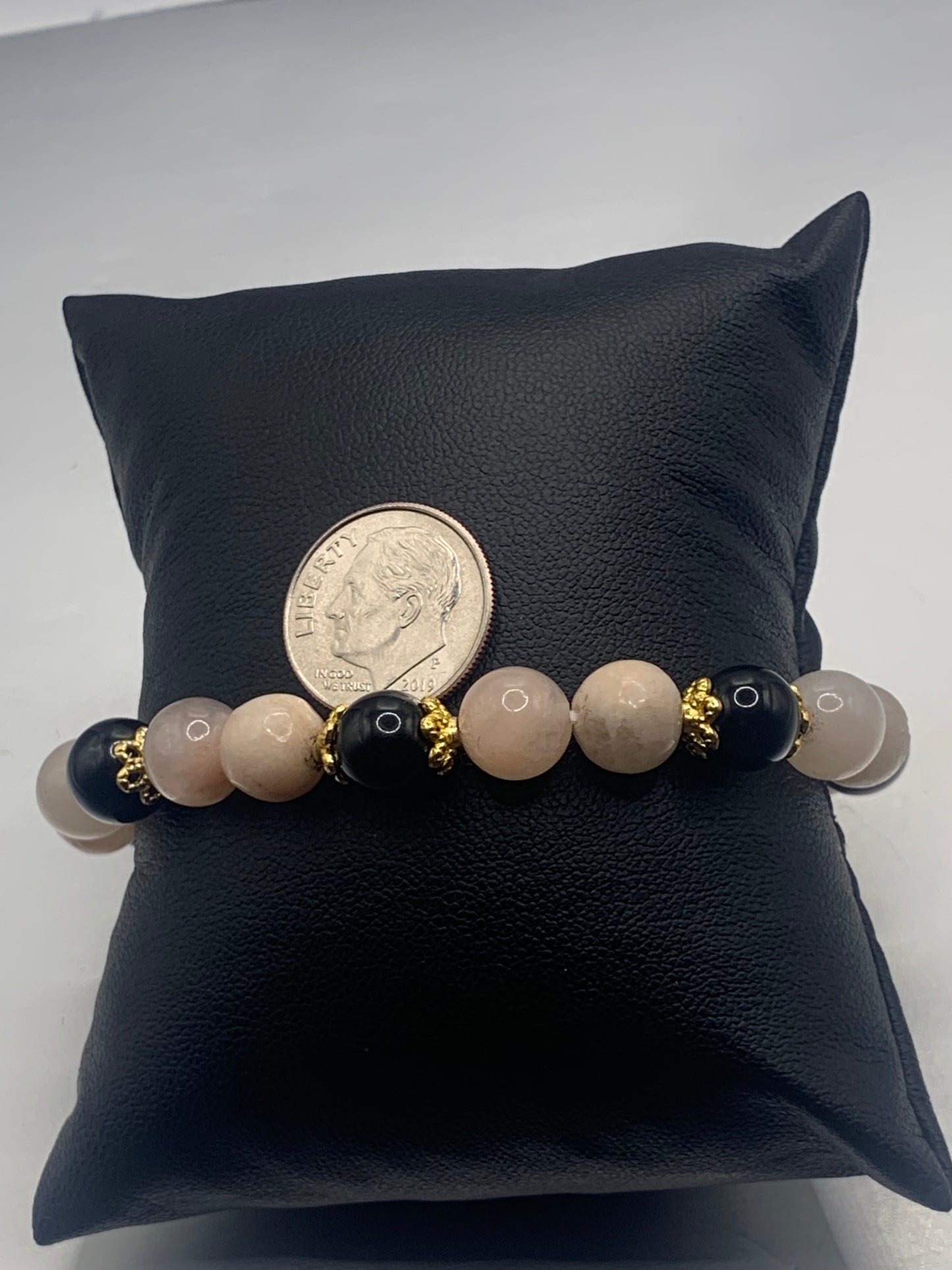 Black obsidian with pink aventurine semi precious stone/crystal beaded elastic bracelet with gold plated flower bead caps