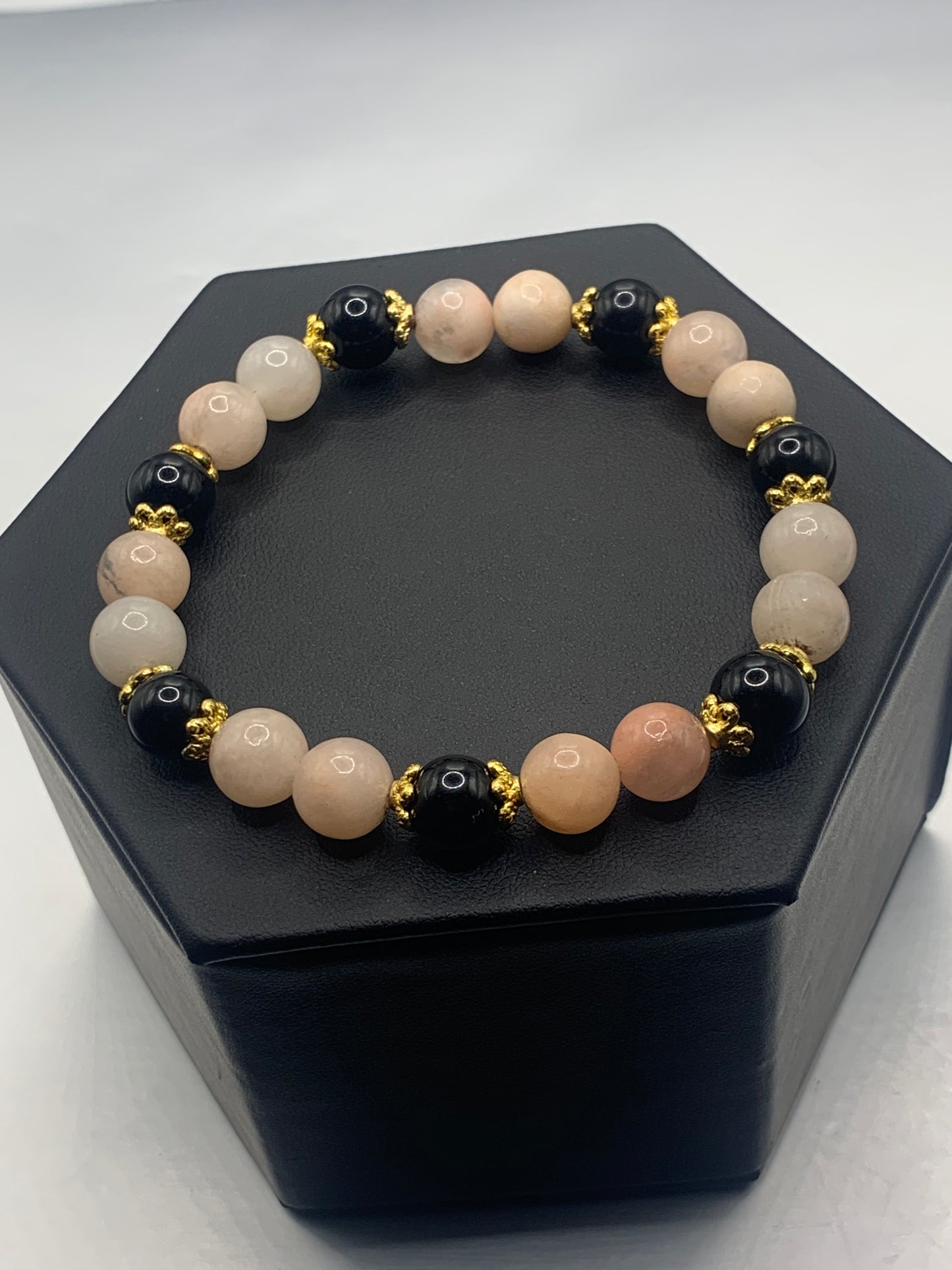 Black obsidian with pink aventurine semi precious stone/crystal beaded elastic bracelet with gold plated flower bead caps